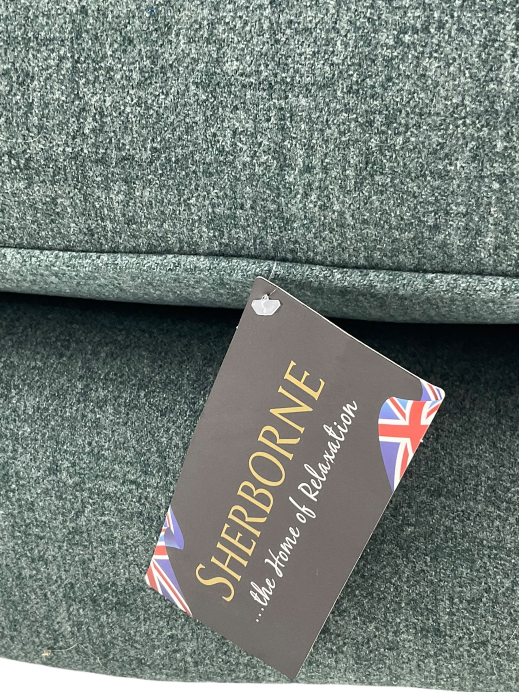 Sherborne England Lyndon fireside armchair, upholstered in Highland Baltic fabric, light oak legs