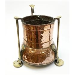 A William Soutter & Sons Arts & Crafts copper jardinière, with three stylised brass supports, with impressed mark beneath, (a/f), H30cm.
