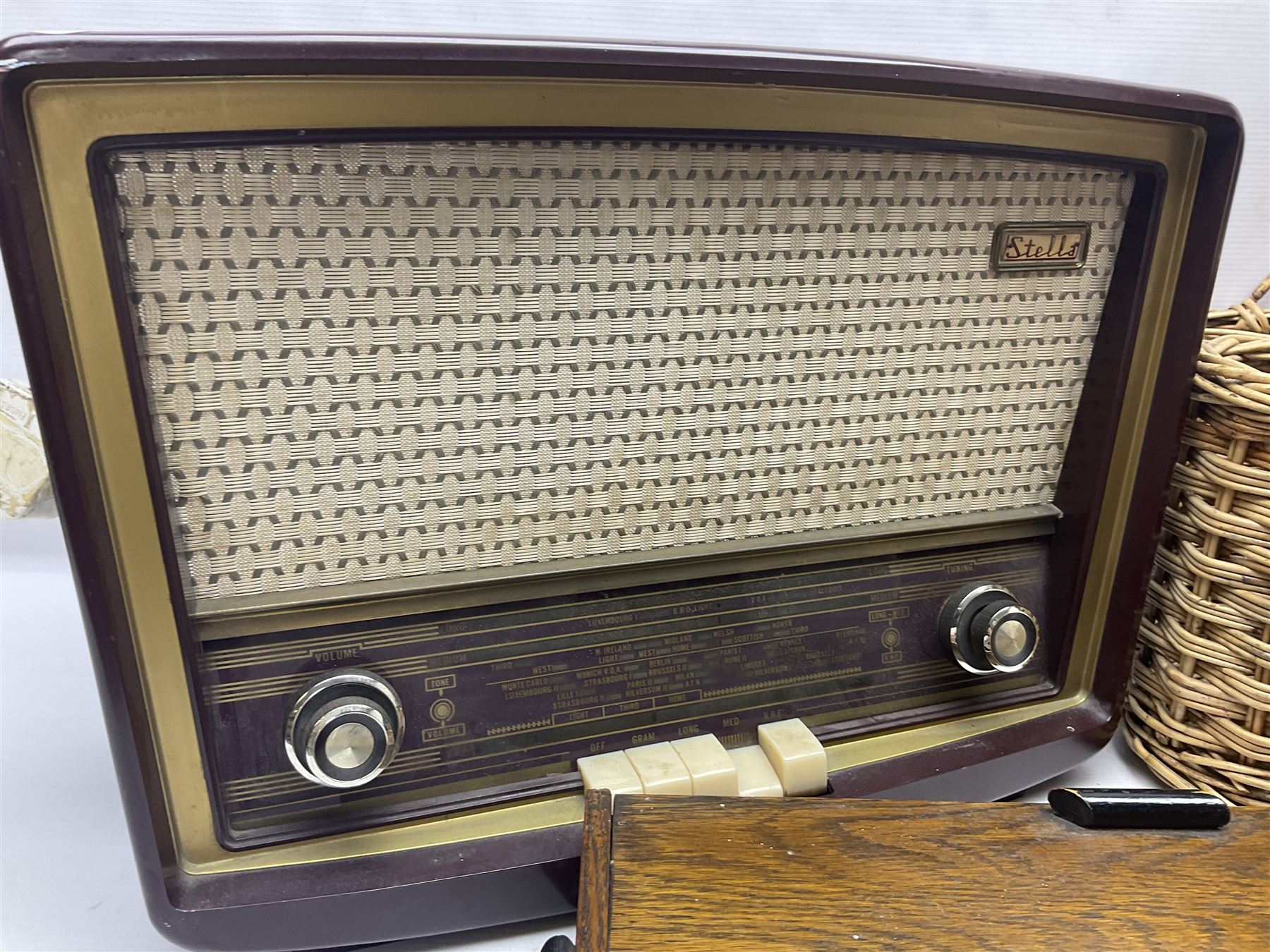 Early 20th century burr walnut tea caddy, Art Deco wooden box, wicker basket with bottle holders and a 1950s Stella radiogram