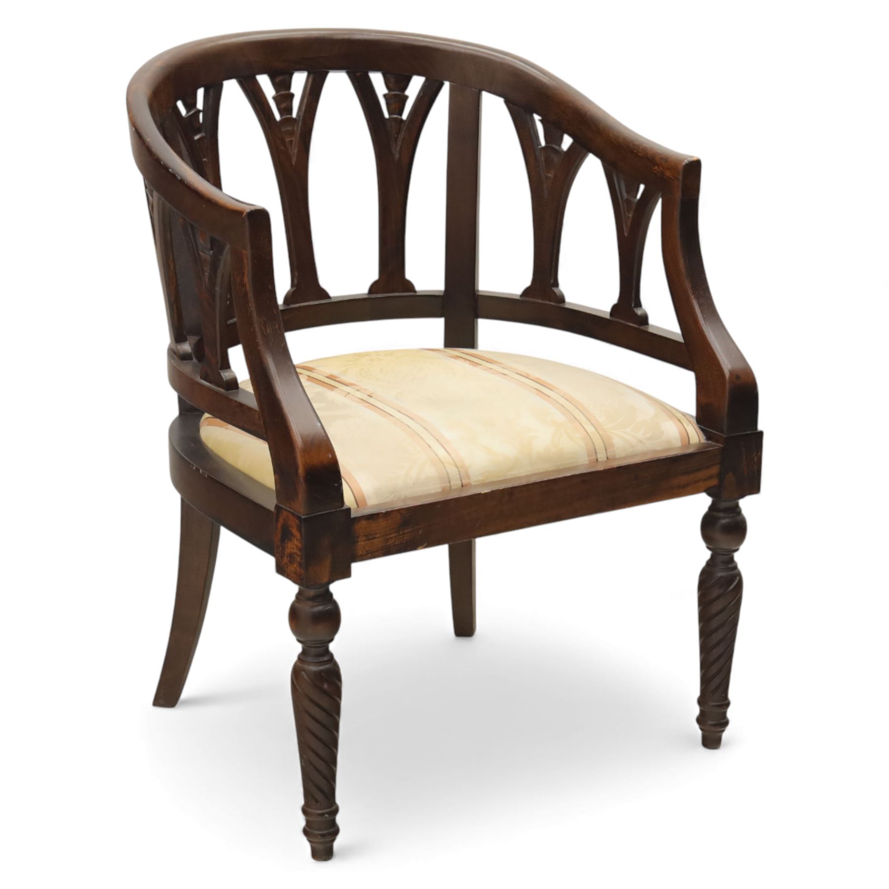 Late 20th century mahogany tub armchair, curved open back with pierced splat supports beneath a rounded top rail, upholstered drop-in seat in patterned fabric, raised on turned and ringed supports