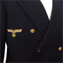 German World War II Kreigsmarine navy blue jacket by Ernst Brendler, Hamburg, with ribbon band, National Emblem and  anchor brass buttons