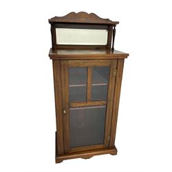 Late Victorian rosewood music cabinet, enclosed by glazed door