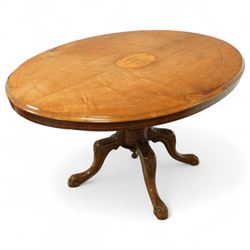 Victorian walnut oval loo table, the top with central marquetry medallion and moulded edge...
