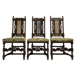 Set six 19th century oak Carolean style dining chairs, the cresting rail with open crown flanked by putto, spiral turned uprights with pineapple finials, canework seat and back, the seat rails carved with foliage, spiral turned supports joined by s-scroll and open crown carved front rail, decorated with flower heads, each with upholstered seat pad