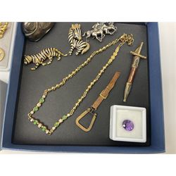 Christian Dior green and clear paste necklace, stamped ChrDior to clasp, together with WMF rabbit rattle, silver horse brooch, loose amethyst stone and six paste animal brooches