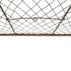 19th century large wrought iron nursery fire guard, of curved form with scrolled brace in the centre