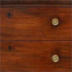 Late George III mahogany bow-fronted chest, the moulded top over three long graduating drawers fitted with turned brass knobs and brass-lined escutcheons, the shaped apron and splayed bracket supports