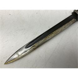 German Model 1884/98 knife bayonet, the 24.5cm fullered steel blade marked Carl Eickhorn 5348a; in steel scabbard with leather frog L42cm overall