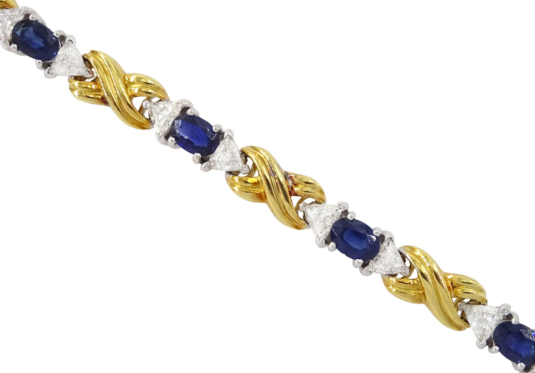 18ct gold eight oval cut sapphire and sixteen trillion cut diamond bracelet, total diamond weight approx 3.25 carat, total sapphire weight approx 4.50 carat
