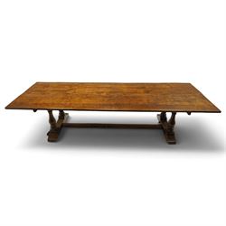 Large 17th century design oak 10ft refectory dining table, the rectangular top raised on twin double-vasiform pedestal end supports on sledge feet, united by chamfered stretcher