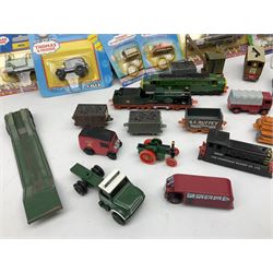 Ertl Thomas the Tank Engine and Friends die-cast models including carded Scrap Trevor, Slate Trucks, Neil, Wilbert, Sodor Taxi, Sodor Recovery Unit, Crane and four key rings; together with various uncarded models including locomotives, coal wagons, steam rollers, boat transporter, recovery units etc (over forty items)