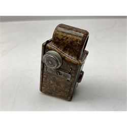 20th century Coronet Midget 16mm camera, in marbled brown Bakelite case with chrome mounts, L6cm, together with a pair of 9ct gold (tested) spectacles in case