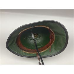 Police - Victorian turned hardwood truncheon with traces of decoration and VR cypher L42cm; Humberside Police helmet with Queens Crown helmet plate; hand lamp inscribed 'The Inspector'; and small pair of pewter figures of police officers (5)