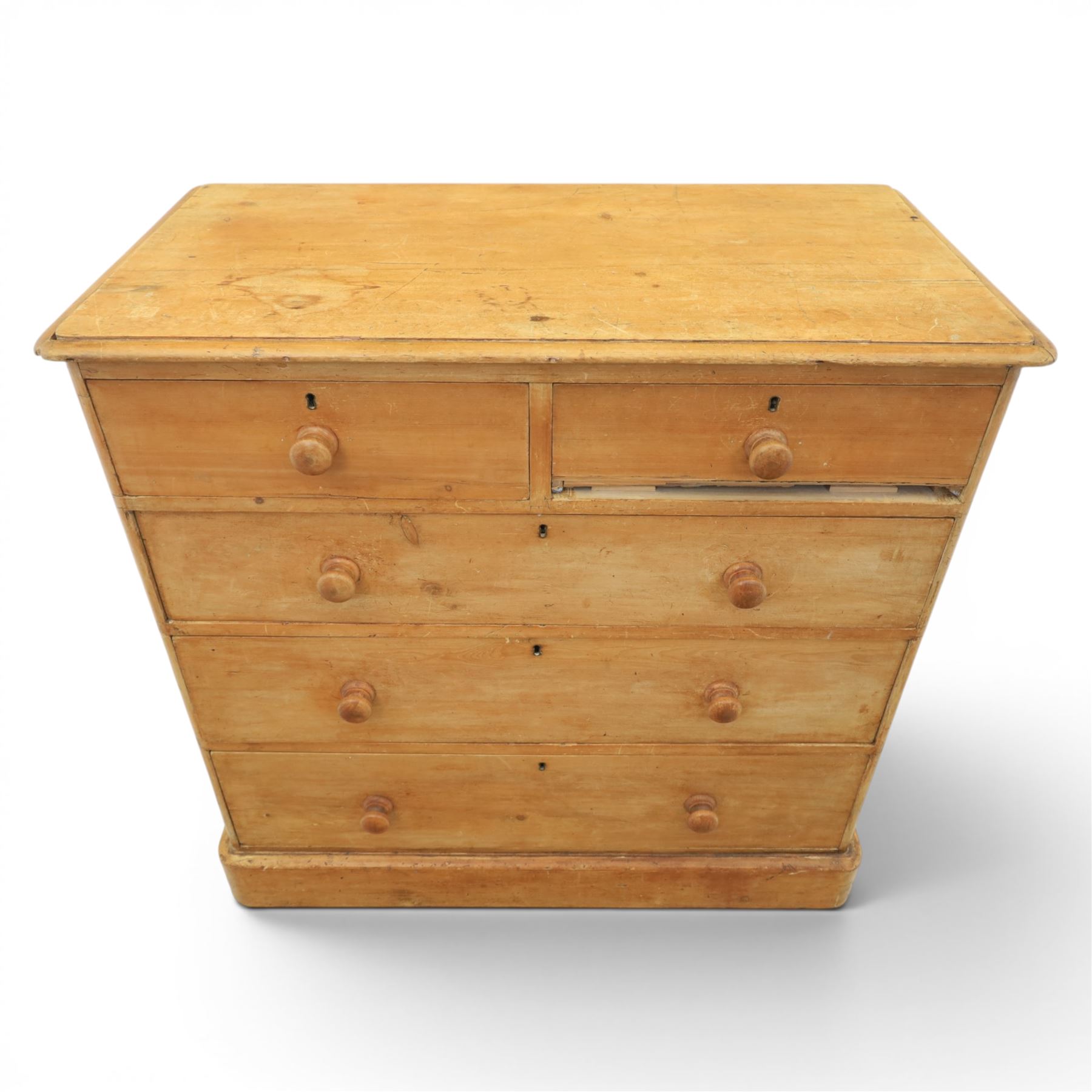Victorian waxed pine chest, fitted with two short and three long drawers, turned wooden handles, raised on plinth base