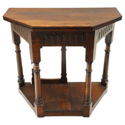 Gothic Revival oak fold-over console table, of octagonal form when unfolded, carved frieze...
