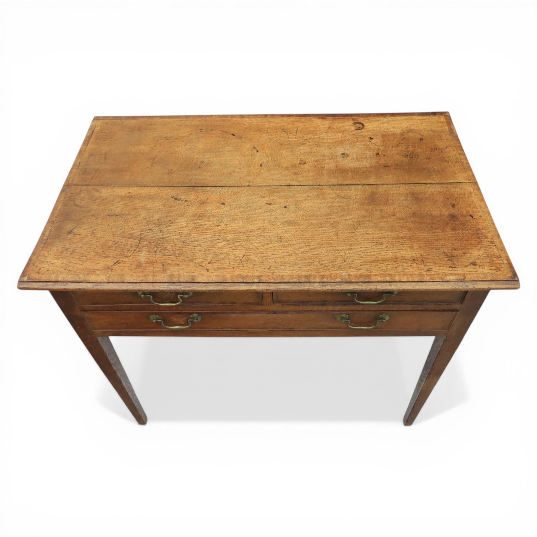 George III oak side table, with rectangular banded top, fitted with two short over three drawers, with brass swan neck handles, raised on square tapering supports