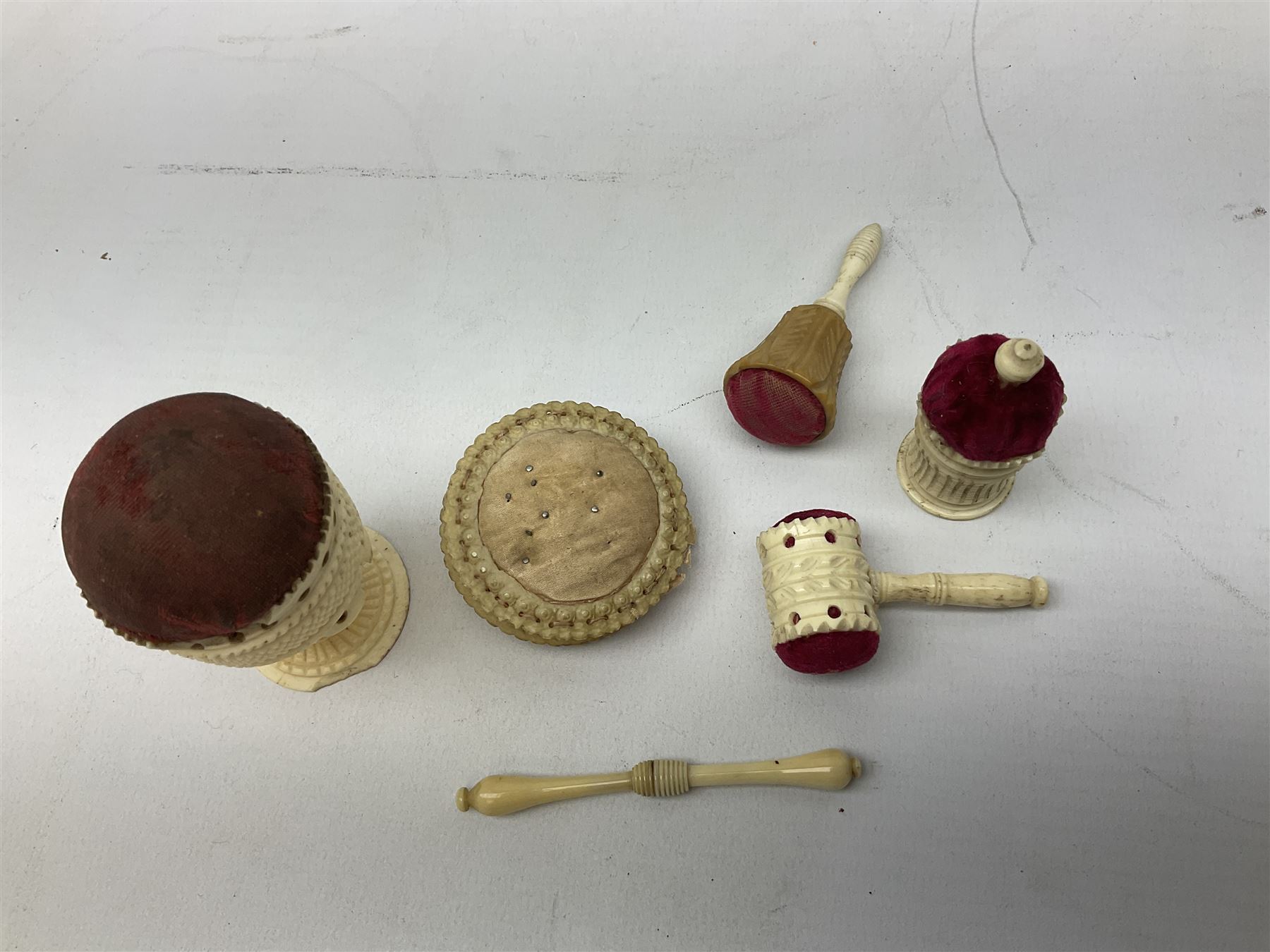 19th century bone and vegetable ivory sewing items including needles cases, pin cushions, thimble cases etc