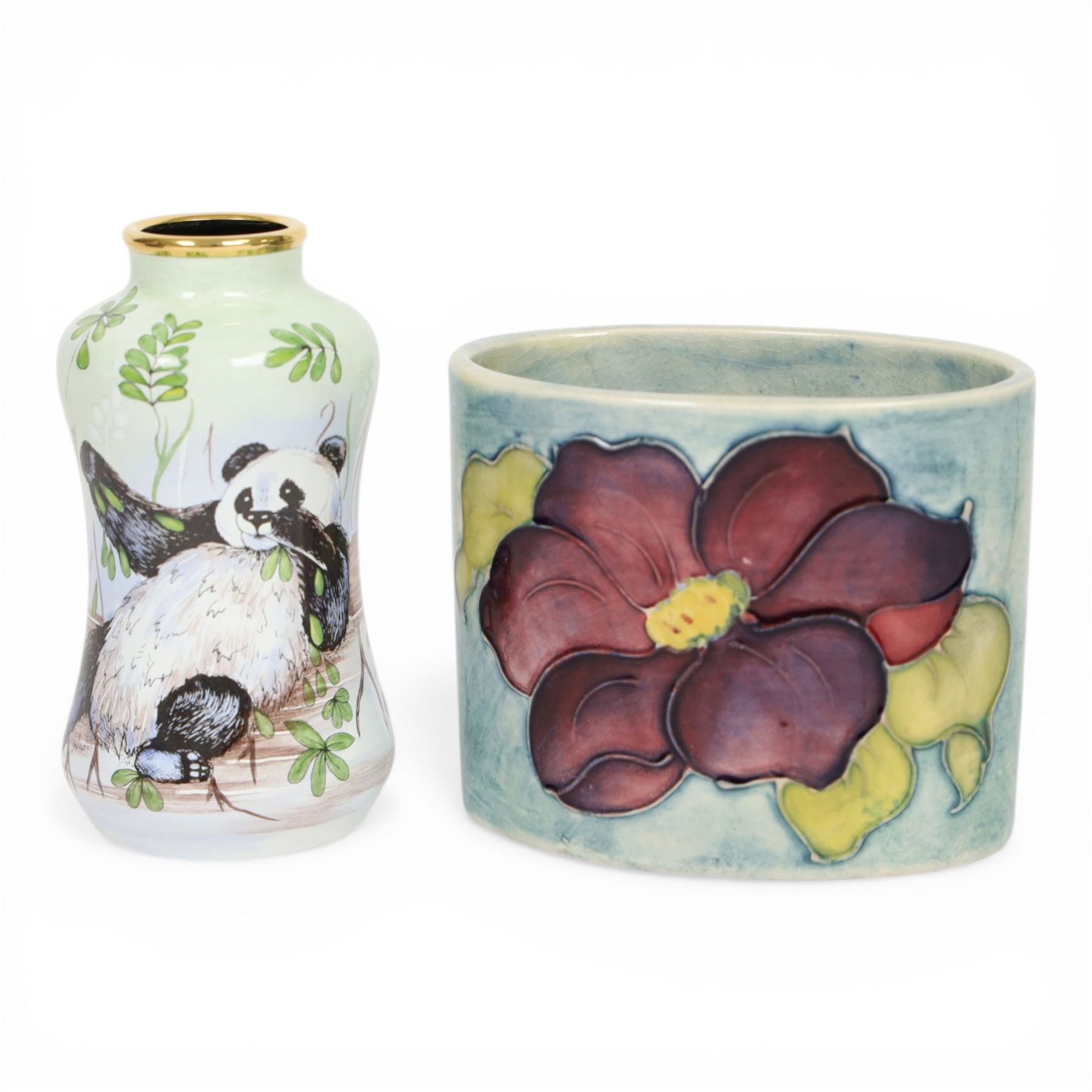 Moorcroft enamel vase, decorated with pandas, in box together with a small Moorcroft vase clematis pattern, enamel vase H8cm