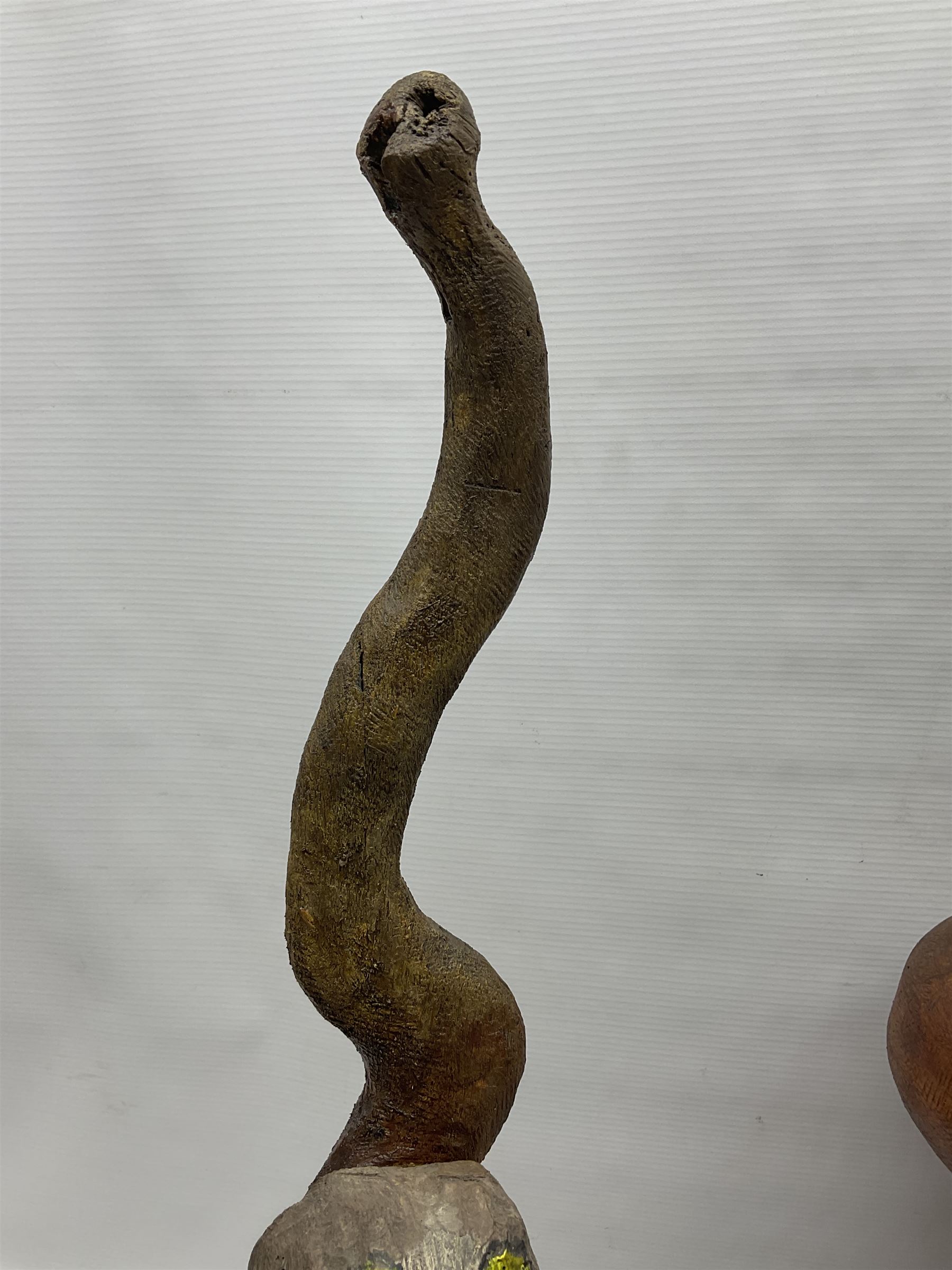 Helen Skelton (British 1933 – 2023): Three carved wooden abstract sculptures, each modelled as a cat, with carved or painted features, largest H63cm. Born into an RAF family in 1933 in Kent and travelled the world extensively during her childhood. After settling in Bridlington, Helen immersed herself in painting, textiles, and wood sculpture, often inspired by nature's beauty. Her talent was showcased in a one-woman show at Sewerby Hall and recognised with the sculpture prize at Ferens Art Gallery in 2000. Sadly, Helen’s daughter passed away from cancer in 2005. This loss inspired Helen to donate her sculptures to Marie Curie upon her passing in 2023.