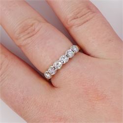 18ct gold diamond half eternity ring, channel set with six round brilliant cut diamonds, London 1998, total diamond weight approx 0.80 carat