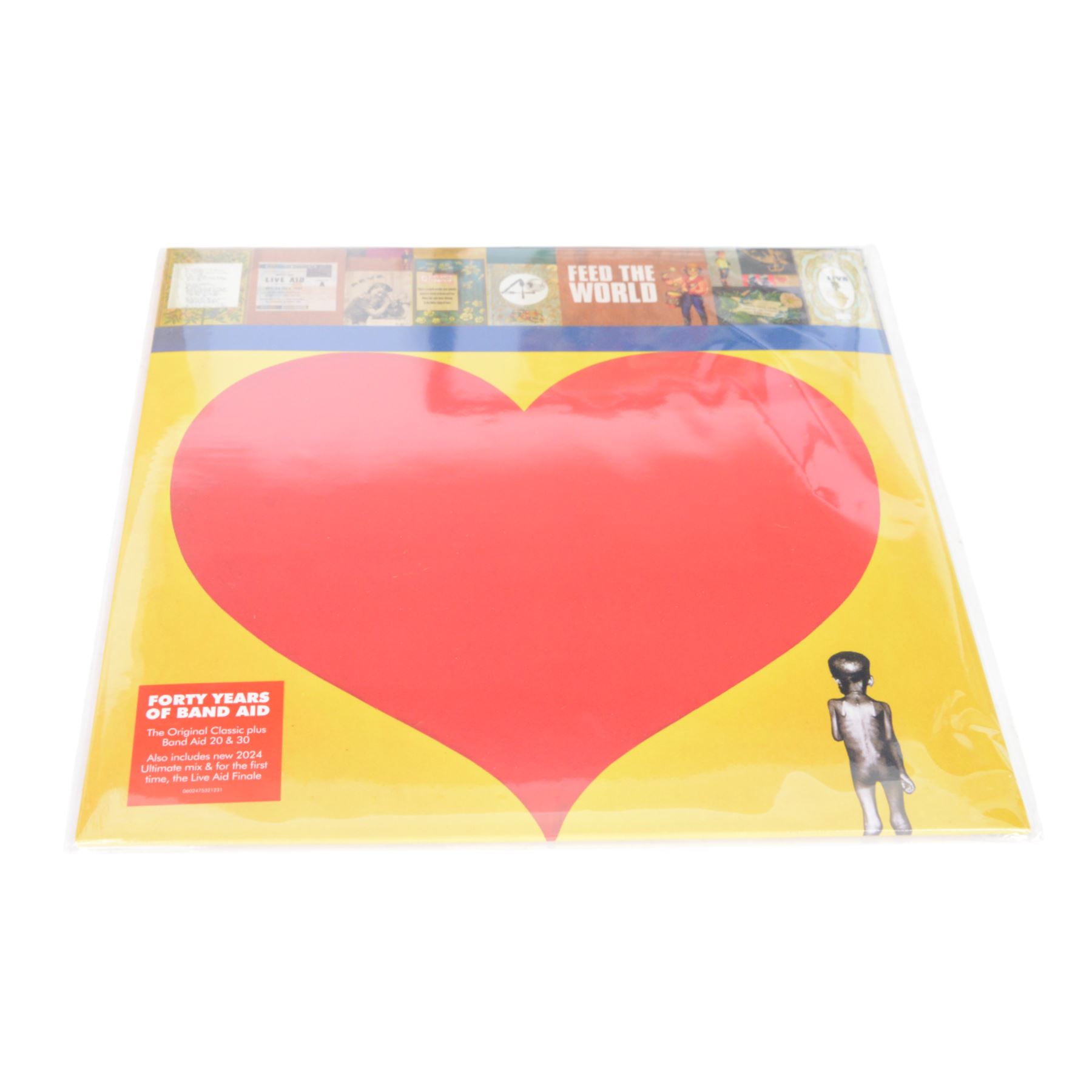 Band Aid vinyls and CDs in framed display, including original Do They Know Its Christmas? and later editions Band Aid II, Band Aid 20 and Band Aid 30, together with limited edition 40th anniversary edition Feed The World 12