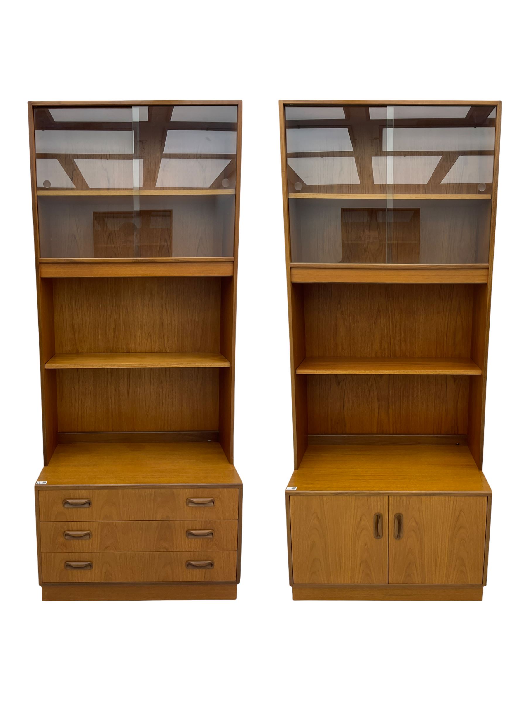 G-Plan teak two sectional modular wall display cabinet, fitted with sliding glass doors, double cupboard and three drawers