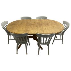 20th century pine extending dining table, oval top over twin bulbous turned pedestal base united by stretcher, with additional leaf (W160cm D120cm H79cm); and set of seven ash painted dining chairs, spindle back, raised on ring turned supports joined by H-stretcher