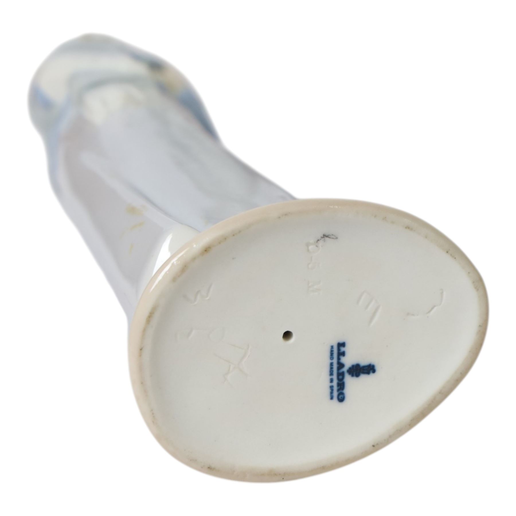 Four Lladro figures, comprising Summer Infatuation 6366, Butterfly Treasures 6777, Girl with Calla Lilies 4650 and Shepherdess with Dog 1034