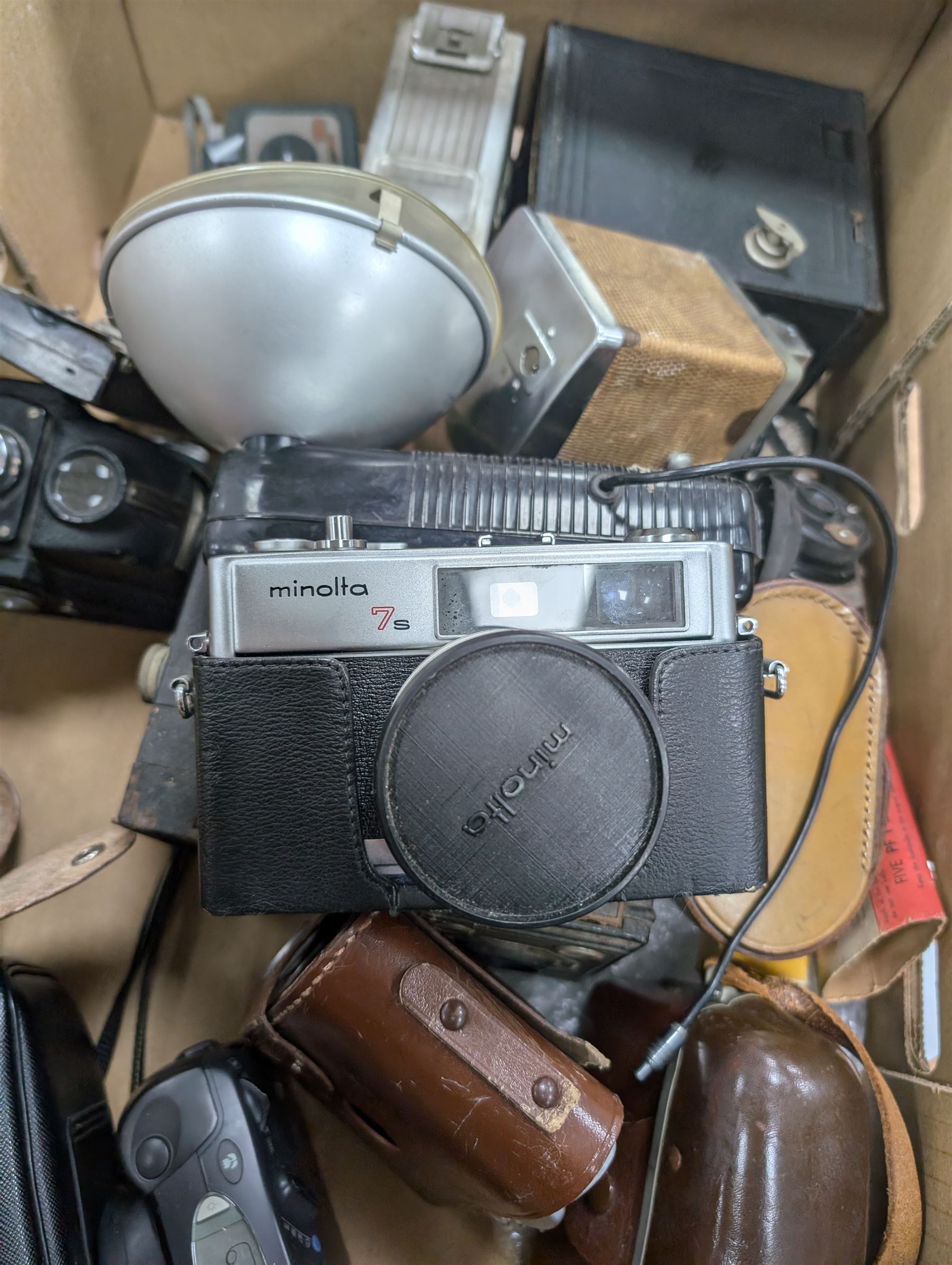 Collection of vintage cameras, including Minolta Hi-Matic 7S, No.2 C. Ensignette Deluxe, Zeiss Ikon etc