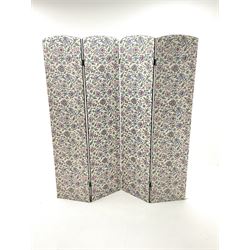 Four panel folding screen, upholstered in an ivory ground fabric with floral pattern