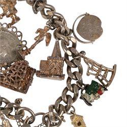 Silver charm bracelet, with seventeen charms including motorbike helmet, enamel toby jug, piano, etc