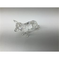 Three Swarovski Crystal figures, comprising 'Rearing White Stallion' from the 'Horses on Parade' collection, 'Doe Deer Standing' no.247963 and German Shepherd, no.235484, all with original boxes