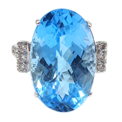  Large 18ct white gold (tested) oval Swiss blue topaz and diamond cocktail ring, topaz approx 19 carat  