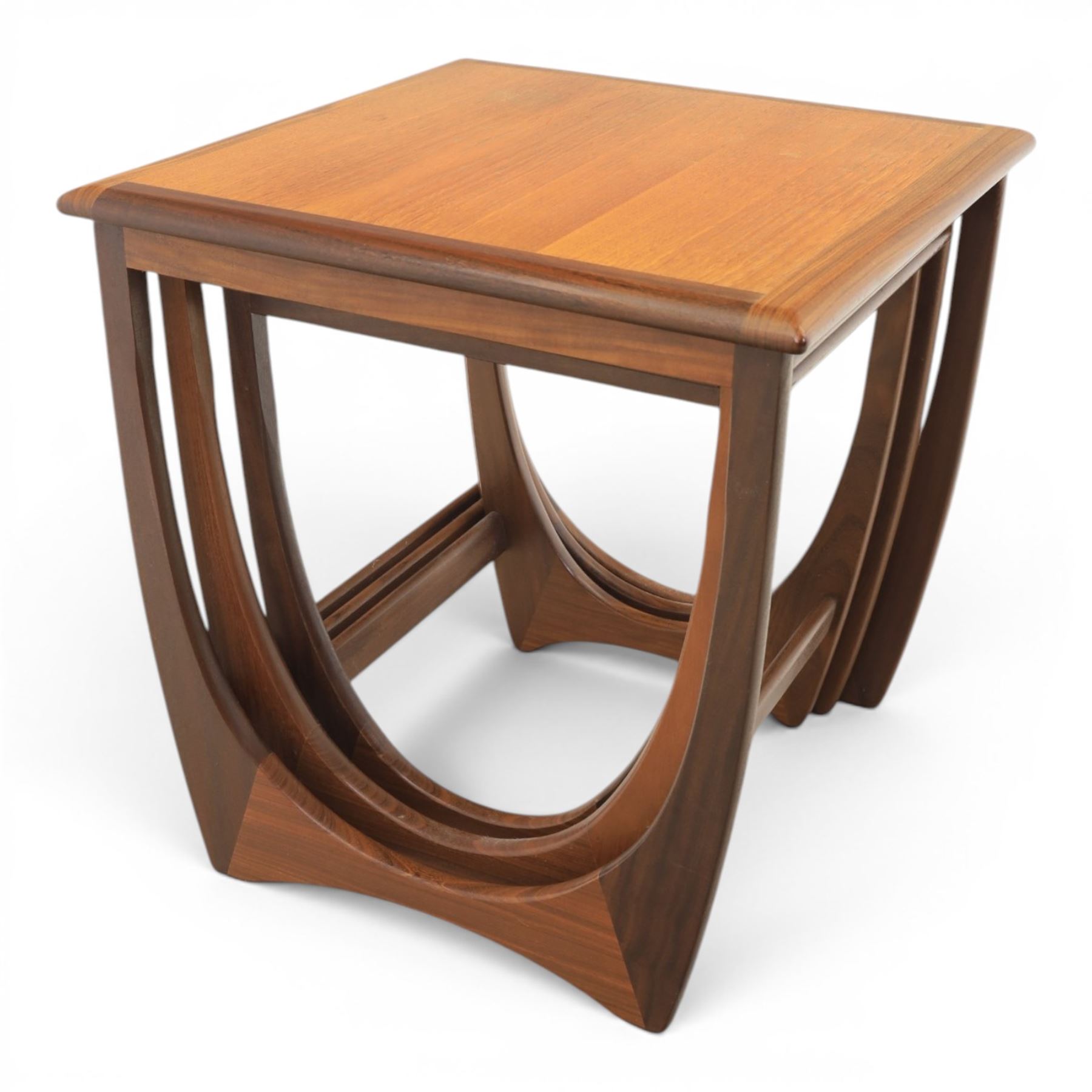 G-Plan - 'Astro' teak nest of three tables, square top with shaped supports