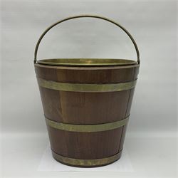 Mahogany and brass bound oyster bucket, of oval form with brass handle and liner, H33cm 