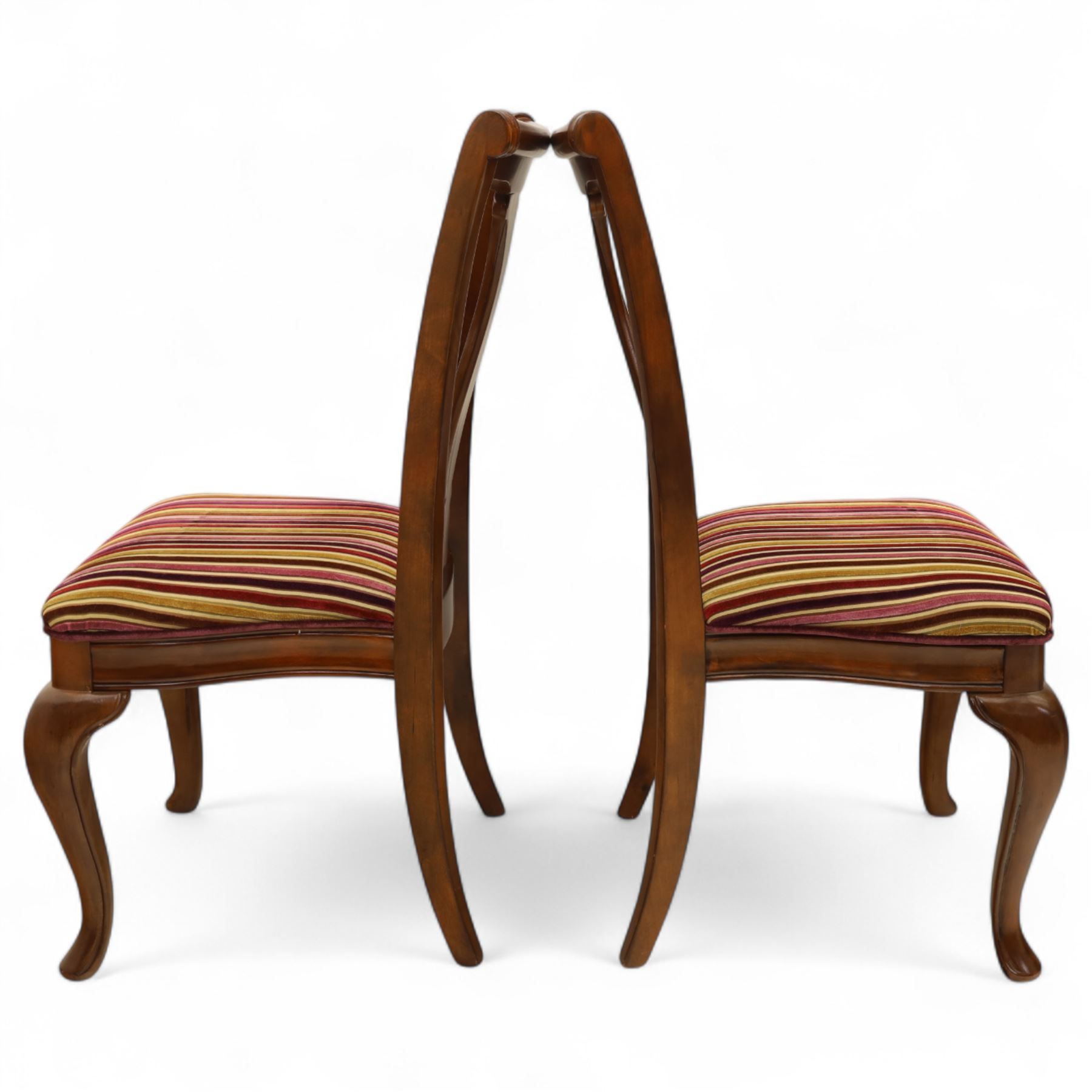 Willis & Gambier - mahogany extending dining table, rectangular top with rounded corners on cabriole legs, with two 35cm extension leaves, four Willis & Gambier upholstered high back chairs and four mahogany chairs, upholstered in a stripped multi-coloured velvet fabric, with scroll-shaped top rail, lyre-shaped back splat on cabriole legs, chairs W46xD91x97cm (11) 