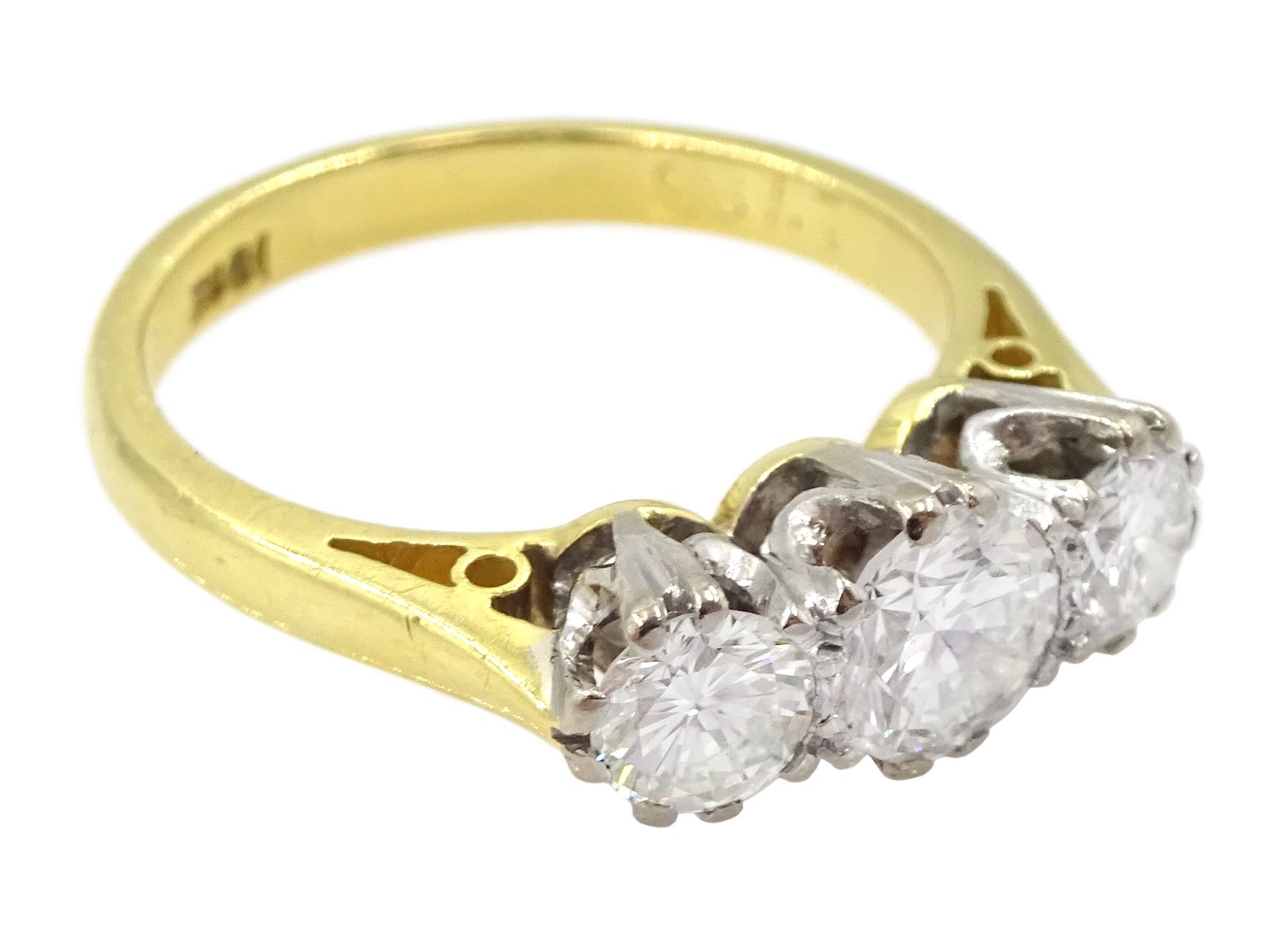 18ct gold three stone round brilliant cut diamond ring, stamped total diamond weight approx 0.95 carat 
