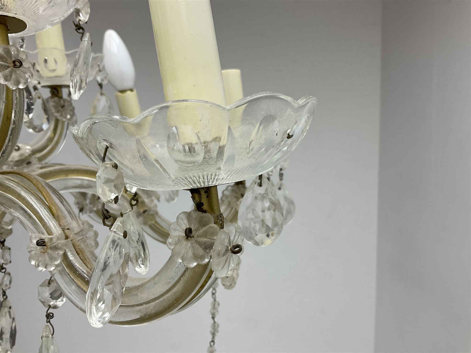 Victorian style glass eight branch chandelier, with drip trays, brass tone support, and drops