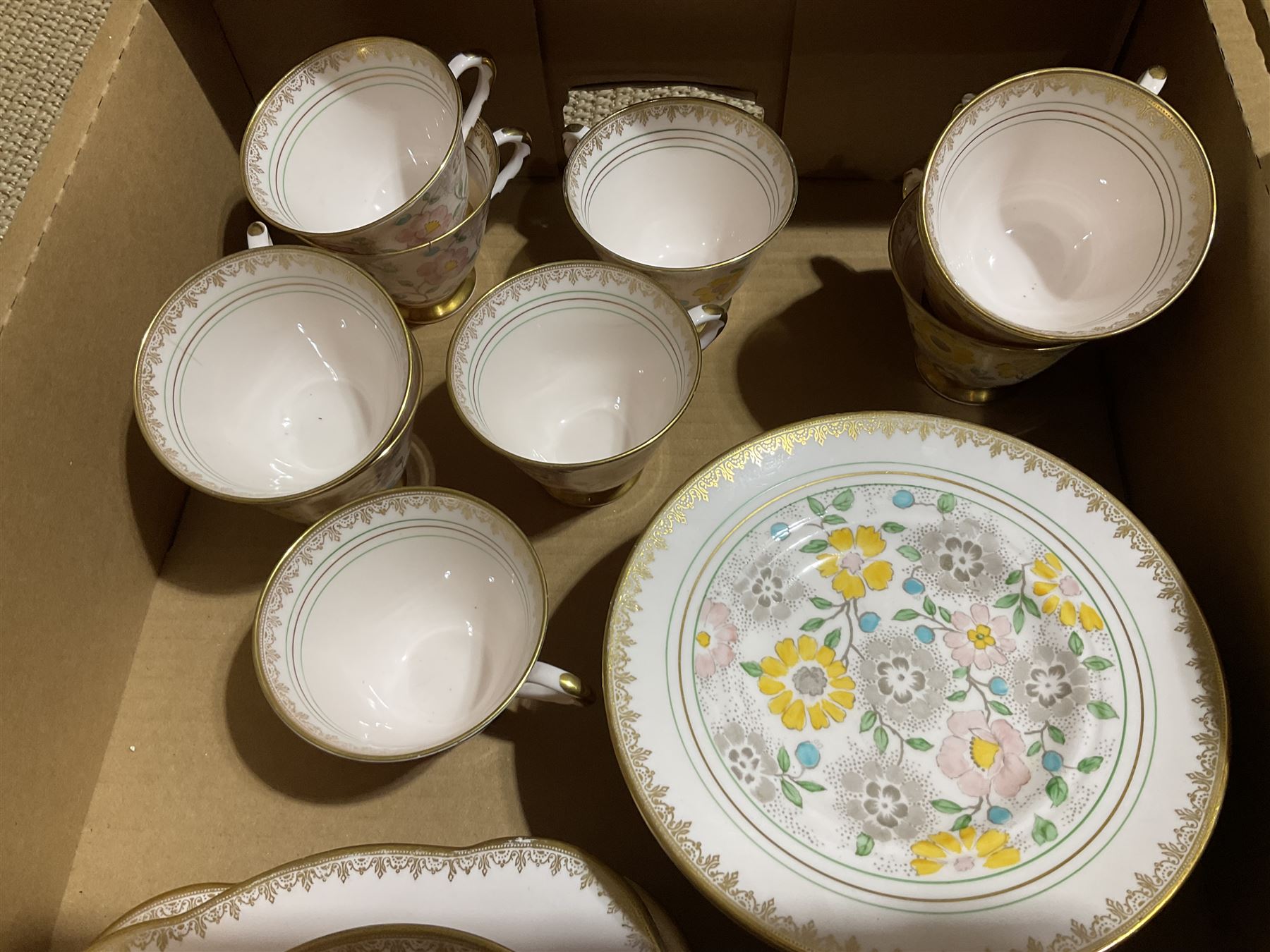 Paragon tea wares decorated in the 'Country Lane' pattern, Plant Tuscan tea set for nine, the pink ground with flower and gilt decoration, Wedgwood 'Mayfield' coffee wares etc in two boxes