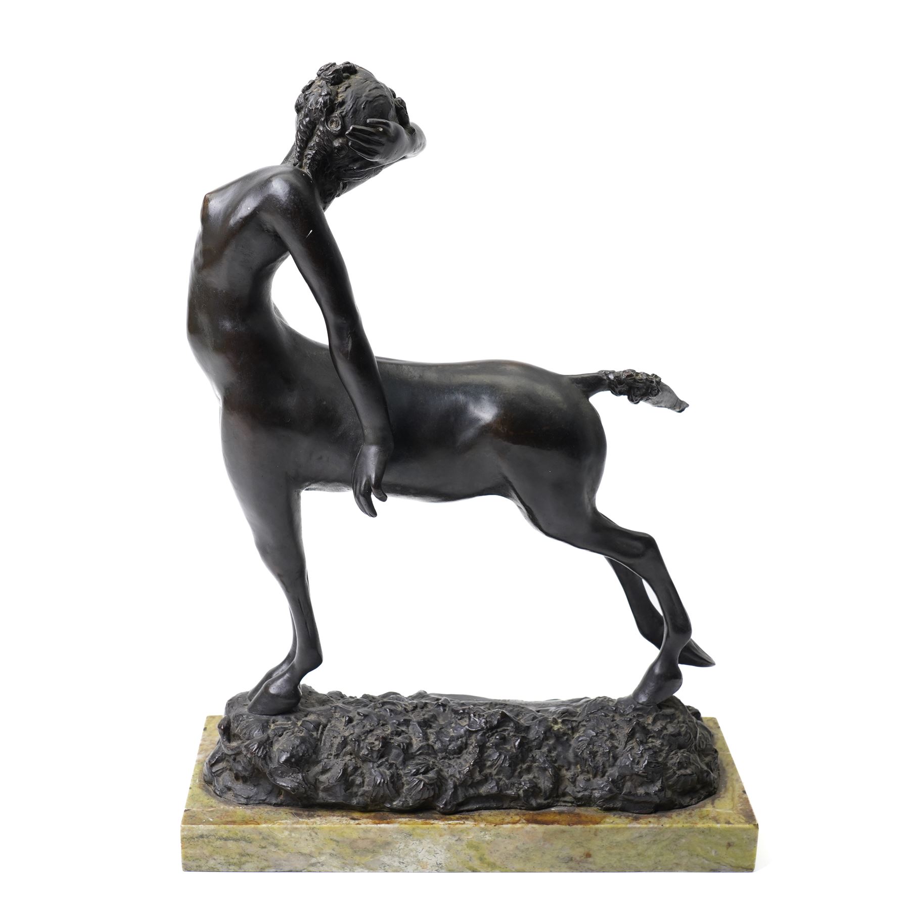 Walter Winans (St Petersburg 1852-1920): The Centauress, bronze model signed and dated 1915 to the naturalistic base, on a rectangular marble plinth, L30.5cm, H42cm

Notes: A finely modelled bronze depicting a rare female centaur, combining classical mythological subject matter with the fluid naturalism characteristic of Winans’ mature work.