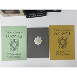 Five reference books on medals and orders including Vaclav Mericka: Book of Orders and Decorations; Polskie ordery i odznaczenia; James C. Risk: The History of the Order of the Bath; Guide des ordres, decorations et medailles militaires 1814-1963; etc; together with two works on Cornish Military Insignia; and Insignes De la Legion Etrangere (8)
