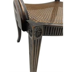 Mid-to late 20th century walnut Hepplewhite design elbow chair, circular cane back with pierced and carved central rosette, fluted frame with scrolling arms, cane seat raised on fluted rail and square tapering supports with spade feet