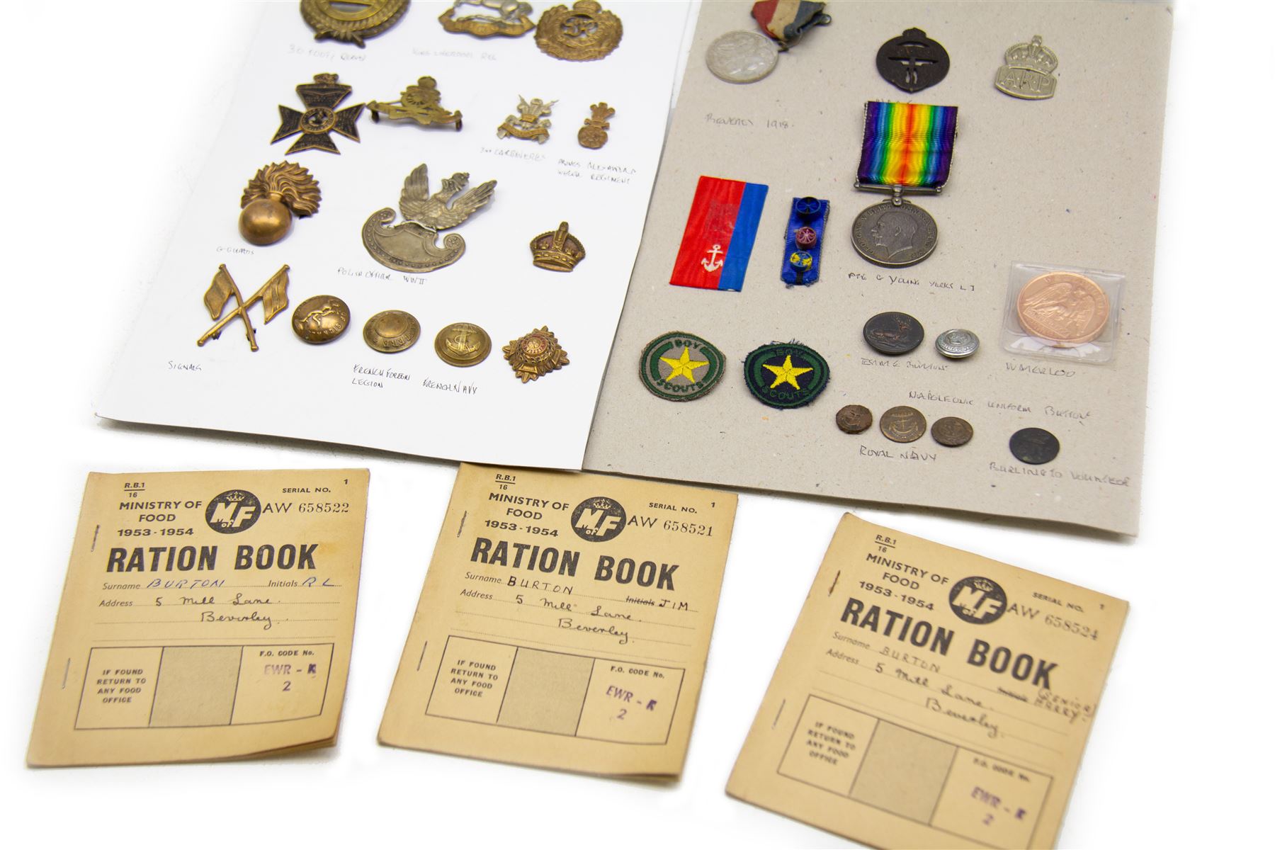 WWI British War Medal named to '60638 Pte C. Young Yorks L I' together with various cap badges, ration books and other military related items 