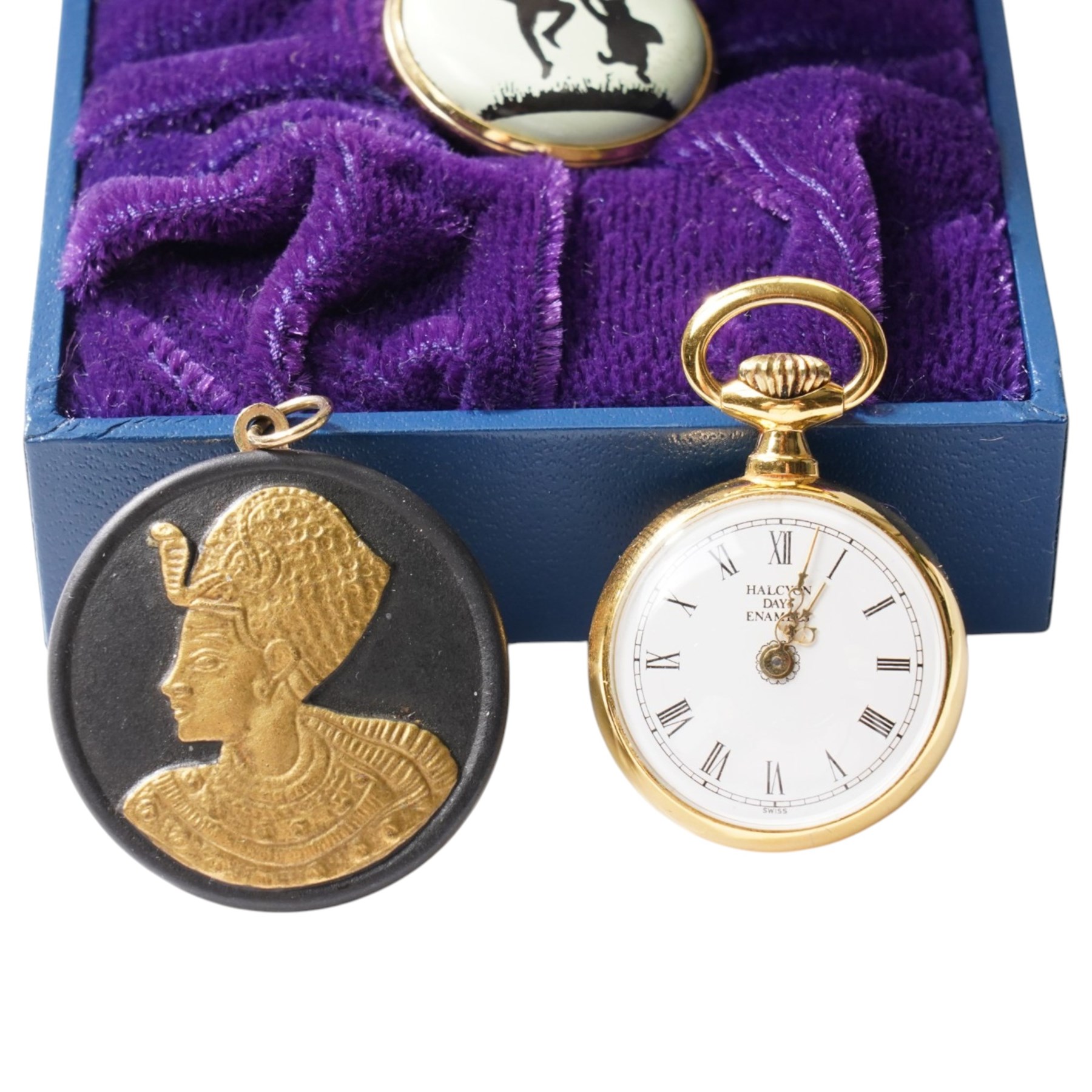 Halcyon Days pocket watch and 'Classic Pooh' enamel box, together with a Wedgwood black basalt Egyptian pendant