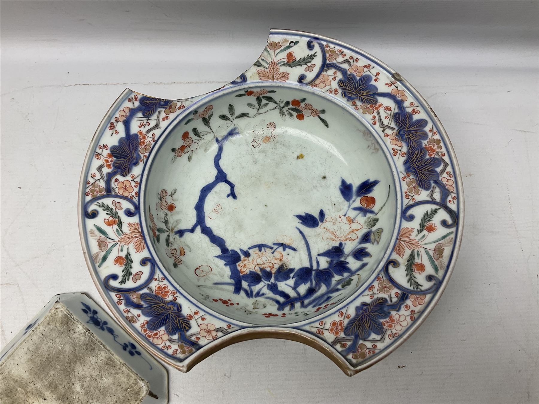19th Century Imari pattern Japanese blood letting bowl, together with 19th century chinese blue and white square dish with decorated with blossoming flowers, together with thee blue and white saucers 