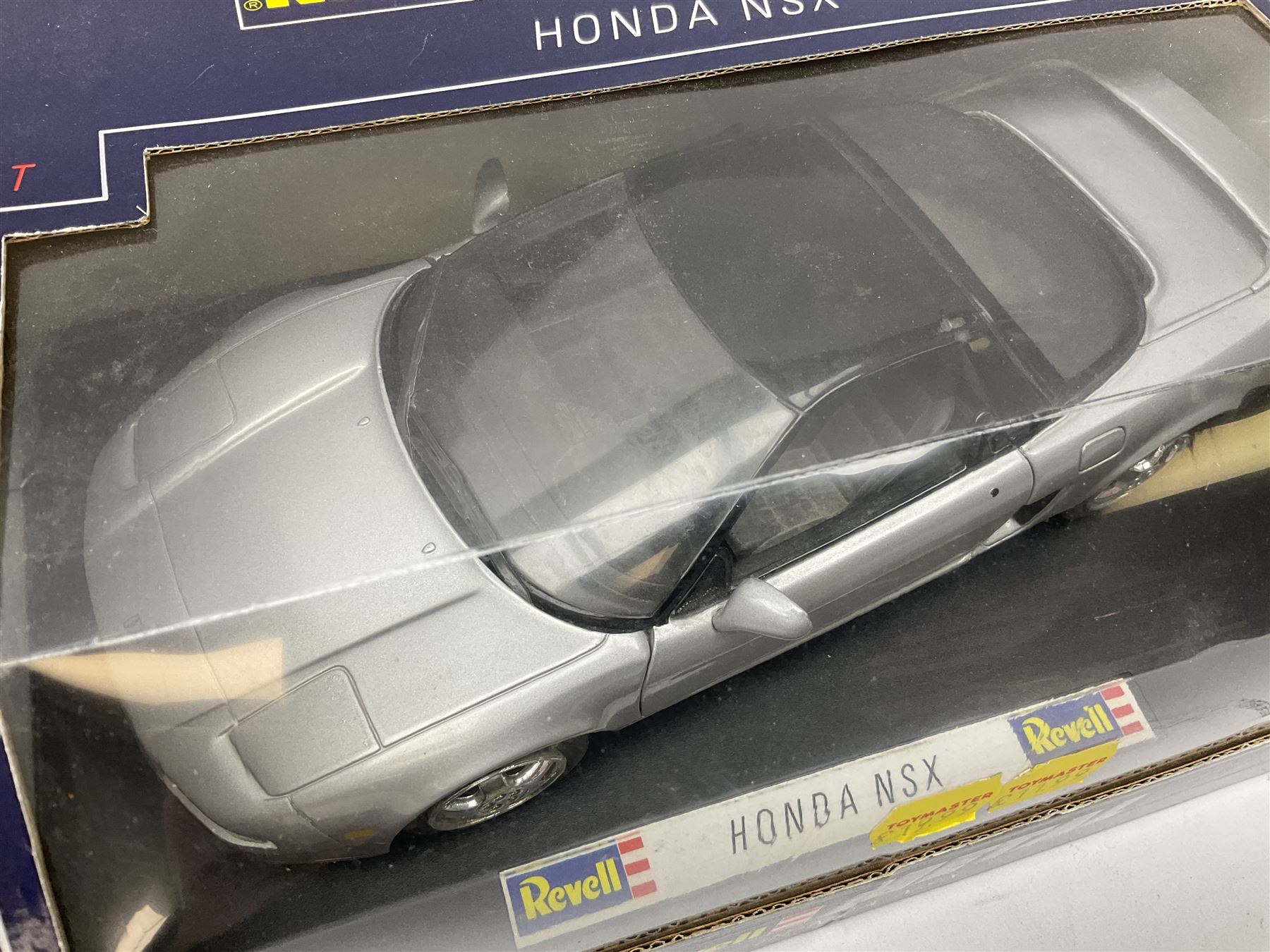 Revell - seven 1:18 scale die-cast models comprising '55 Ford Thunderbird; '56 Thunderbird 'Pink Dream'; '69 Corvette Convertible; 1965 Ford Mustang Convertible; Honda NSX; Pininfarina Mythos; and BMW Isetta 250; all boxed (7)