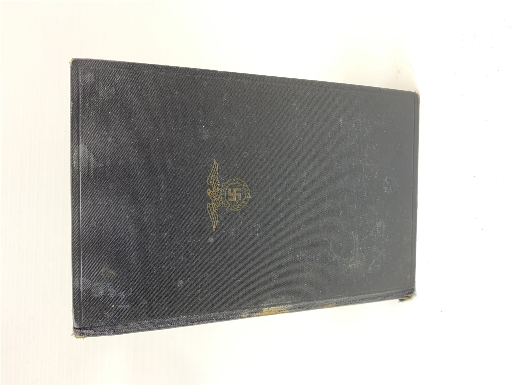 WW2 Kreigsmarine uniform accessories from prisoner of war U-boat Kapitanleutnant Gunther Lorenz comprising cap badge, pair of epaulettes, thirteen buttons marked 1940 and roll of rank braiding and stars; together with copy of Adolf Hitler's Mein Kampf. 1936 published by Zentralverlag Der NSDAP Munchen with German text.