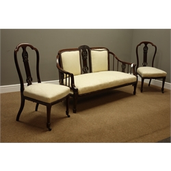  Victorian carved mahogany two seat settee, carved cresting rail with pierced splat carved with acanthus leaves and central urn, square tapering supports with spade feet, upholstered in Damask fabric (W142cm), and a pair matching side chairs  
