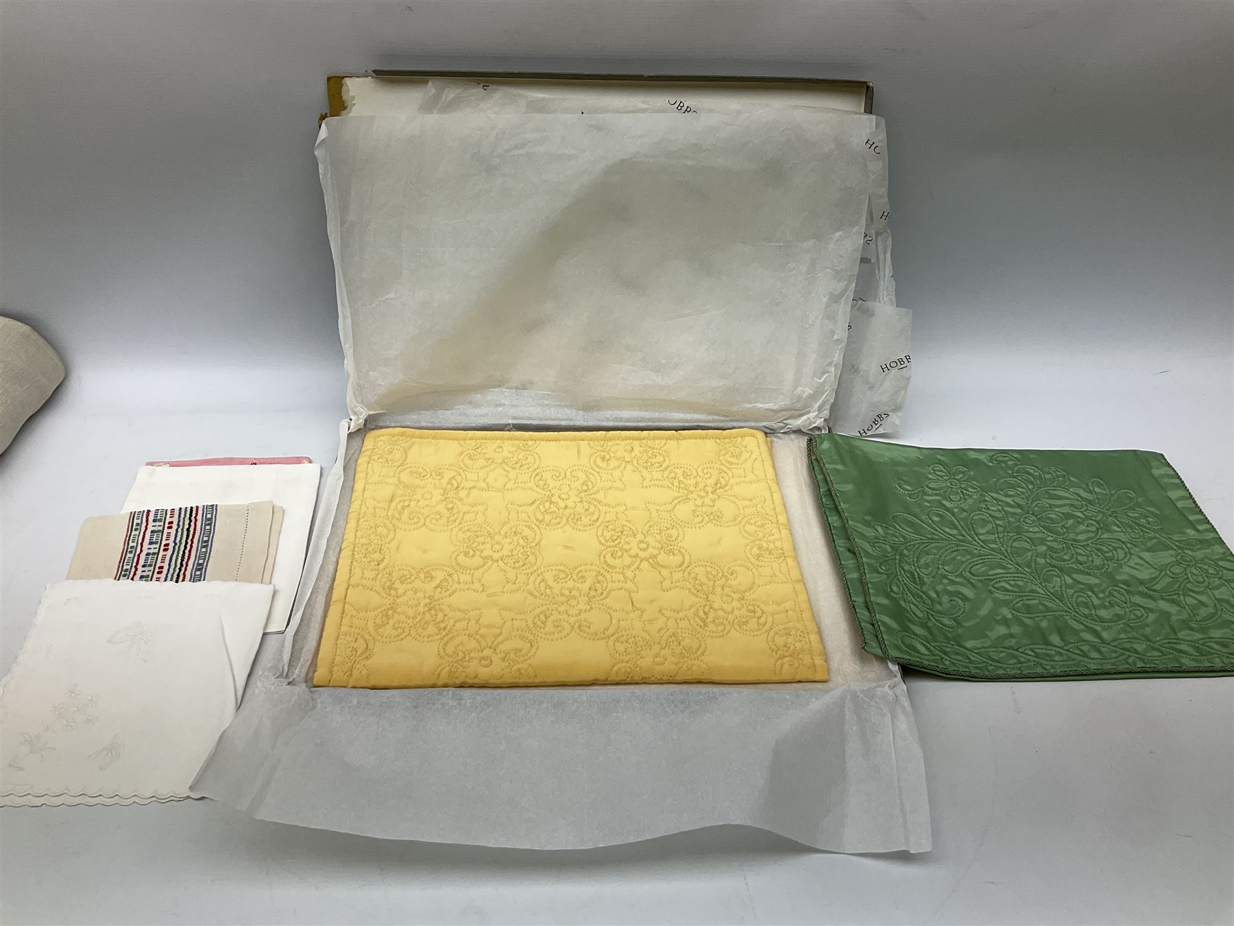 Large quantity of table linen and Victorian and later lace, framed machine tapestry depicting Greece, embroidered wall hanging decorated with a woodland scene with deer and blossoming tree, embroidered linen decorated with floral design, crochet, etc