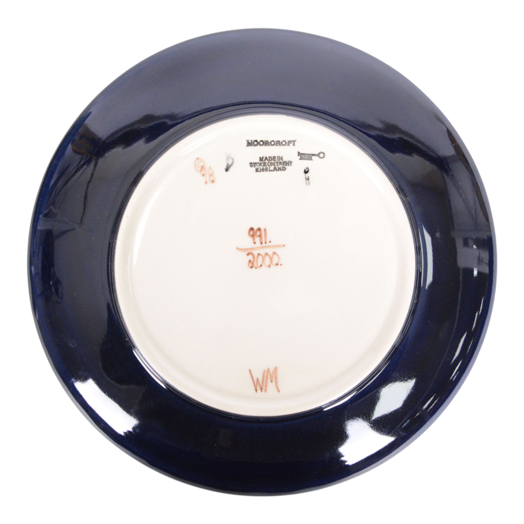 Moorcroft Ingleswood pattern plate, together with Birth of Light pattern plate, both with original box 